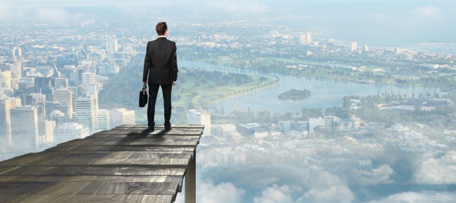 businessman standing on pier